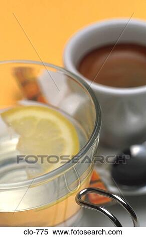 Close Up of Water with Lemon and Coffee Cup View Large Photo Image Stock Photography - Close Up of Water with Lemon and Coffee Cup. Fotosearch
