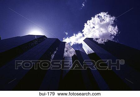 Clouds and Blue Sky Reflections in Glass Buildings View Large Photo Image Stock Photo - Clouds and Blue Sky Reflections in Glass Buildings. Fotosearch