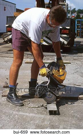 Construction Worker Cutting Girder With Grinder View Large Photo Image Stock Photo - Construction Worker Cutting Girder With Grinder. Fotosearch