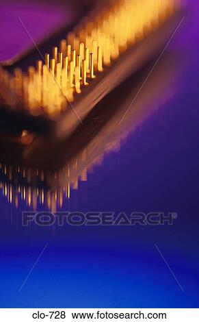 Corner of Computer Chip against Blue Background View Large Photo Image Stock Photo - Corner of Computer Chip against Blue Background. Fotosearch