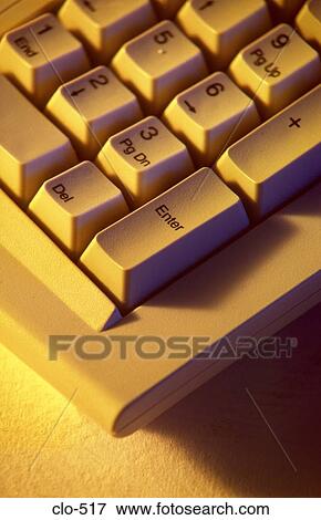 Corner of Keyboard under Yellow Coloured Light View Large Photo Image Stock Photo - Corner of Keyboard under Yellow Coloured Light. Fotosearch