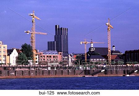 Cranes and Skyline View Large Photo Image Stock Photography - Cranes and Skyline. Fotosearch