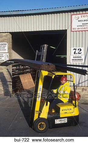 Fork Lift Truck Carrying Angle Iron UK View Large Photo Image Stock Image - Fork Lift Truck Carrying Angle Iron UK. Fotosearch