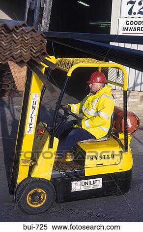 Fork Lift Truck Carrying Angle Iron UK View Large Photo Image Stock Photography - Fork Lift Truck Carrying Angle Iron UK. Fotosearch