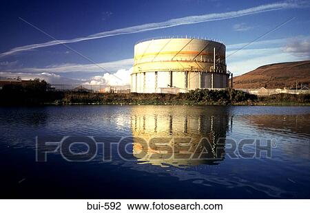 Gasometer and Cloud Formations Reflected in River View Large Photo Image Stock Image - Gasometer and Cloud Formations Reflected in River. Fotosearch