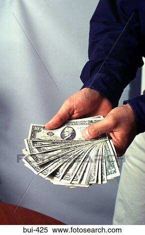 Hand Fanning US Banknotes View Large Photo Image Stock Photography - Hand Fanning US Banknotes. Fotosearch
