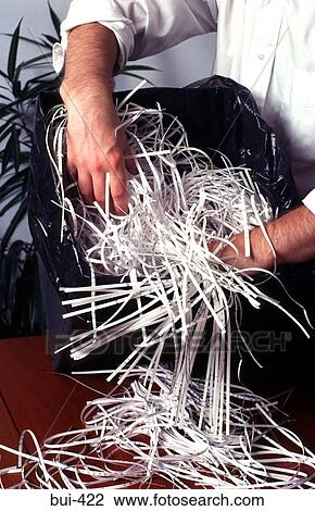 Hand Filling Bin with Shredded Paper View Large Photo Image Stock Image - Hand Filling Bin with Shredded Paper. Fotosearch
