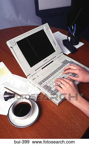 Hands using Laptop Computer at a Desk View Large Photo Image Stock Photo - Hands using Laptop Computer at a Desk. Fotosearch