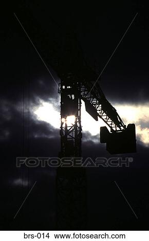 Large Crane Silhouetted Against Stormy Sky UK View Large Photo Image Picture - Large Crane Silhouetted Against Stormy Sky UK. Fotosearch