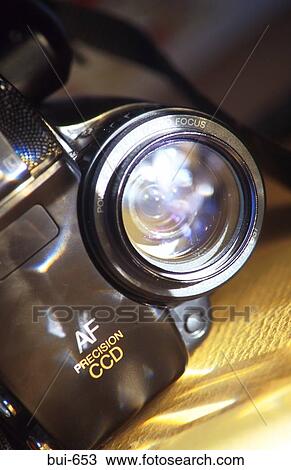 Stock Image - Lens of Domestic Camcorder. Fotosearch