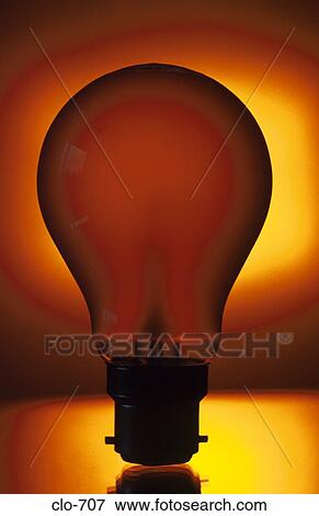 Light Bulb against Orange Background View Large Photo Image Stock Photo - Light Bulb against Orange Background. Fotosearch