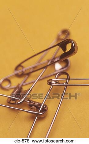 Linked Safety Pins View Large Photo Image Stock Photo - Linked Safety Pins. Fotosearch