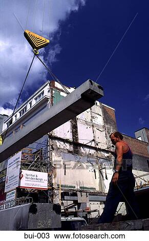 Lintel and Workman on a Building Site Belgium View Large Photo Image Stock Image - Lintel and Workman on a Building Site Belgium. Fotosearch
