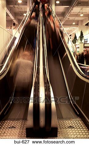 Long Exposure Photograph of People Using Escalator View Large Photo Image Stock Photo - Long Exposure Photograph of People Using Escalator. Fotosearch