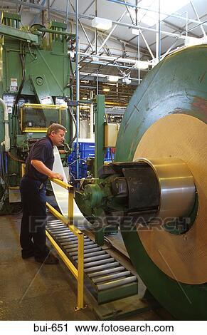 Man Handling Roll of Sheet Metal Wales UK View Large Photo Image Stock Image - Man Handling Roll of Sheet Metal Wales UK. Fotosearch