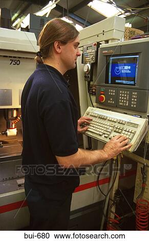 Man Operating Machine Controls in Factory View Large Photo Image Stock Image - Man Operating Machine Controls in Factory. Fotosearch