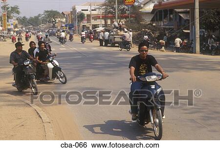 Men Riding Mopeds Siem Reap Cambodia View Large Photo Image Stock Photograph - Men Riding Mopeds Siem Reap Cambodia. Fotosearch