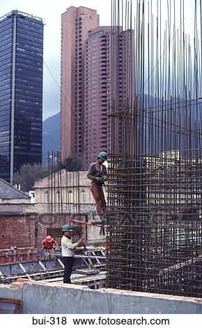 Men working on Steel Building Structure Colombia View Large Photo Image Stock Photo - Men working on Steel Building Structure Colombia. Fotosearch