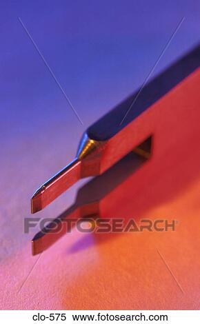 Metal Pronged Device in Blue and Red Coloured Light View Large Photo Image Stock Photography - Metal Pronged Device in Blue and Red Coloured Light. Fotosearch