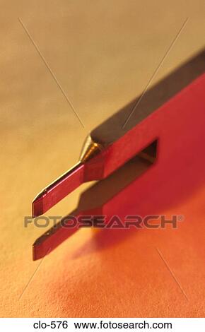 Metal Pronged Device in Red and Yellow Light View Large Photo Image Stock Photograph - Metal Pronged Device in Red and Yellow Light. Fotosearch
