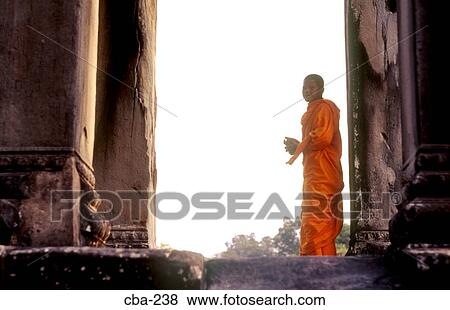 Stock Photo - Monk Angkor Wat Siem Reap Cambodia. Fotosearch