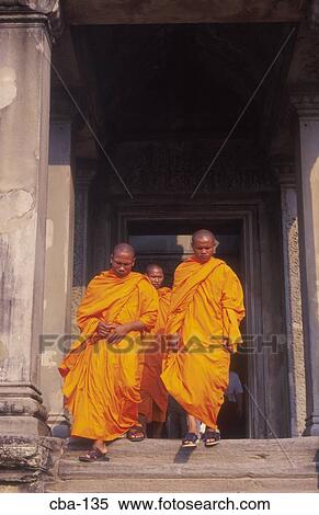 Stock Photography - Monks in Saffron Robes Angkor Wat Cambodia. Fotosearch