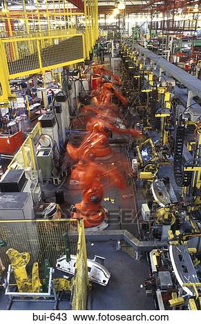 Motion Blurred Robotic Arms Working in Factory View Large Photo Image Stock Image - Motion Blurred Robotic Arms Working in Factory. Fotosearch