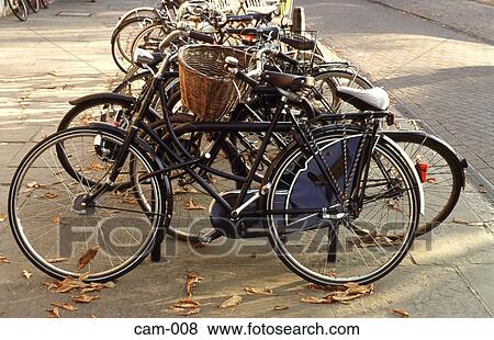 Stock Photo - Parked Chained Bicycles Cambridge UK. Fotosearch