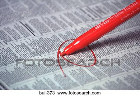 Pen Circling Newspaper Advertisement View Large Photo Image Stock Image - Pen Circling Newspaper Advertisement. Fotosearch