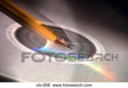 Pencil Highlighted by Reflections from a CD View Large Photo Image Stock Photo - Pencil Highlighted by Reflections from a CD. Fotosearch
