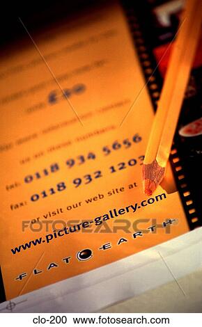 Pencil on Printed Colour Advertisement View Large Photo Image Stock Image - Pencil on Printed Colour Advertisement. Fotosearch