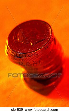 Pile of Pound Coins in Yellow Light View Large Photo Image Stock Photo - Pile of Pound Coins in Yellow Light. Fotosearch