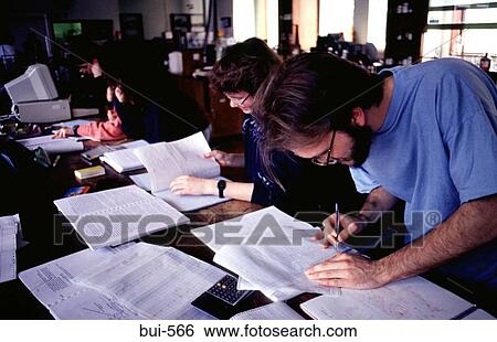 Stock Photograph - Research Team Checking Results UK. Fotosearch