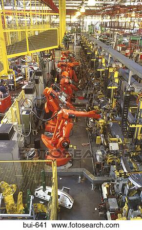 Robotic Arms Working on Production Line View Large Photo Image Stock Image - Robotic Arms Working on Production Line. Fotosearch