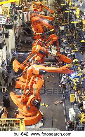 Robotic Arms Working on Production Line View Large Photo Image Stock Image - Robotic Arms Working on Production Line. Fotosearch