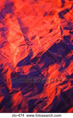 Scrunched Newspaper in Red and Blue Light View Large Photo Image Picture - Scrunched Newspaper in Red and Blue Light. Fotosearch