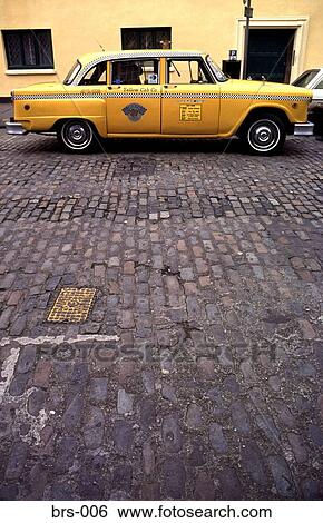 Side View of American Yellow Taxi on Cobbled Road View Large Photo Image Stock Photograph - Side View of American Yellow Taxi on Cobbled Road. Fotosearch