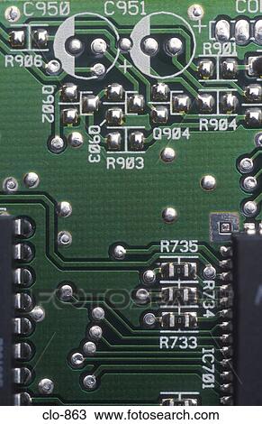 Stock Image - Silicon Chip on Circuit Board. Fotosearch