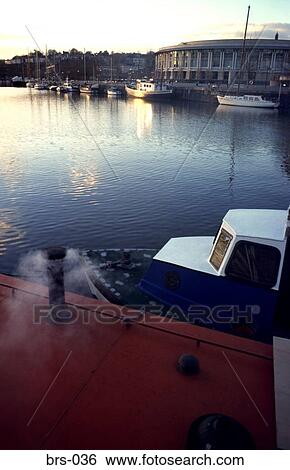 Stock Photograph - Smoke Rising from Funnel on Boat at Bristol Docks UK. Fotosearch