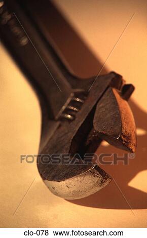 Spanner Head on a Yellow Background View Large Photo Image Stock Photo - Spanner Head on a Yellow Background. Fotosearch