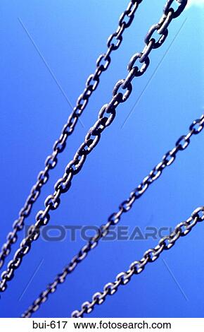 Stock Photo - Steel Chains against Clear Blue Sky. Fotosearch