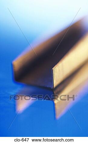 Stick of Staples under Blue Light View Large Photo Image Stock Photo - Stick of Staples under Blue Light. Fotosearch
