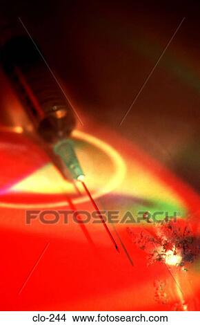 Syringe and Powder under Red Light View Large Photo Image Picture - Syringe and Powder under Red Light. Fotosearch