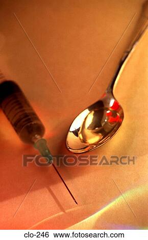 Syringe and Spoon Containing Liquid View Large Photo Image Stock Photograph - Syringe and Spoon Containing Liquid. Fotosearch
