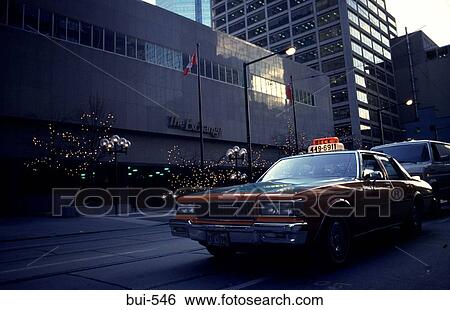 Taxi by Toronto Stock Exchange Canada View Large Photo Image Stock Photograph - Taxi by Toronto Stock Exchange Canada. Fotosearch