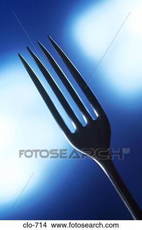 Tines against Blue Background View Large Photo Image Picture - Tines against Blue Background. Fotosearch