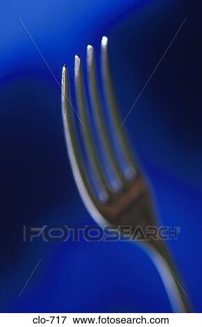 Tines against Blue Background View Large Photo Image Stock Photo - Tines against Blue Background. Fotosearch