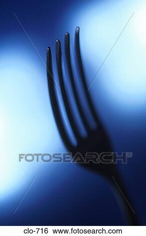 Tines against Blue Background View Large Photo Image Stock Photograph - Tines against Blue Background. Fotosearch