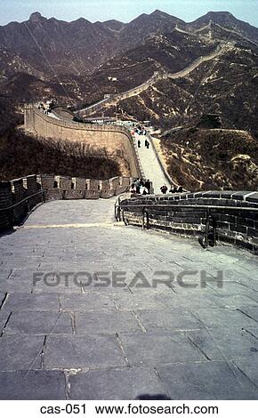Stock Image - Tourists on Road on Great Wall of China. Fotosearch
