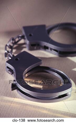 Stock Photo - Toy Handcuffs. Fotosearch